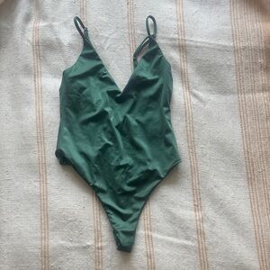 Never been worn retro metallic emerald green V-Neck thong one piece